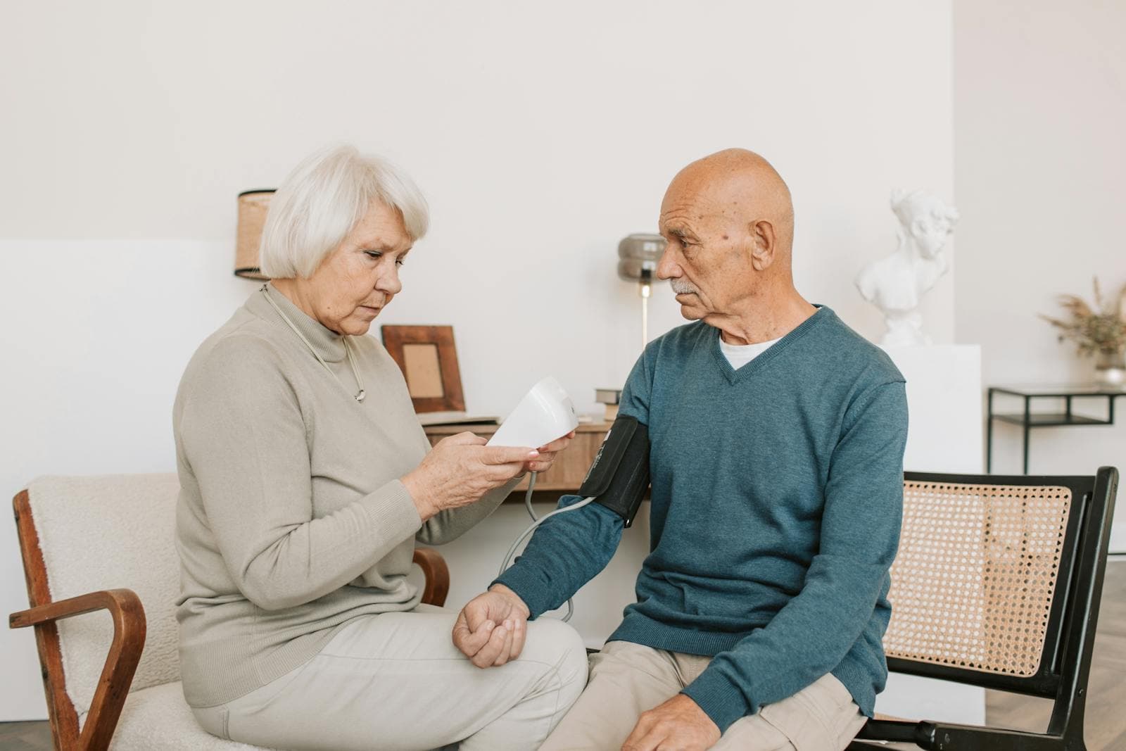 Care professional reviewing health and support needs with an adult participant